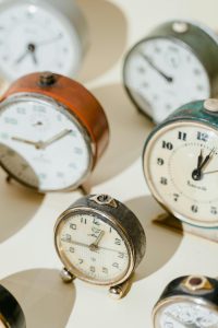 various hand clocks showing different times
